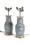 A pair of Cantonese blue-ground vases, circa 1880, each with lion and cub handles and coiled dragons