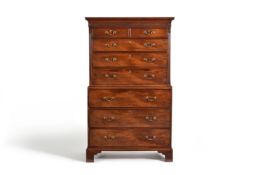 A George III mahogany secretaire chest on chest, third quarter 18th century, the dentilled cornice