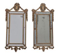 A pair of continental, probably Italian, marginal wall mirrors, early 19th century, each with