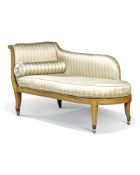 A Regency ochre-painted chaise longue, early 19th century, the scrolling back, side and seat