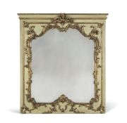 A Louis XV green painted and gilded overmantel mirror, circa 1775, the moulded cornice above a