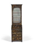 A Chinese Export black lacquer black lacquered bureau bookcase, early 18th century, of narrow