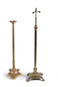 A gilt metal standard lamp base in the manner of Thomas Hope, early 20th century, the lobed top