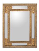 A painted and parcel gilt wall mirror in mid-17th century style, 19th century, the bevelled plate