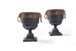 A pair of black japanned and gold painted tole jardinieres, first half 19th century, of urn form,