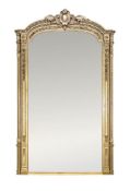 A French large gilt-gesso pier mirror, 19th century, the arched cresting centred by a cabochon,