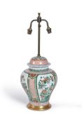 A Chinese ‘Famille Verte’ vases and cover, in 17th century style but late 19th or 20th century,