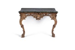 A pine console table, 19th century, of 18th century style, carved with rococo style shell and