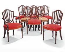 ϒ A set of sixteen George III stlye mahogany shield back dining chairs, 20th century