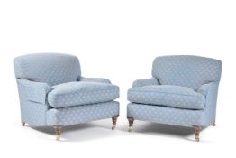 A pair of blue and gilt floral upholstered armchairs, of recent manufacture, possibly by Kingcome