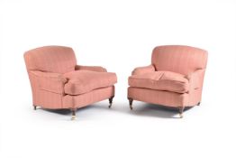 A pair of pink chenille type upholstered armchairs, of recent manufacture, each with a removable