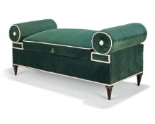 An upholstered window seat, 20th century, upholstered in green velvet, the seat lifting to reveal