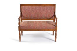 A Restauration fruitwood two seater canape, second quarter 19th century, the rectangular padded back