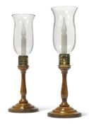 A pair of turned and stained hardwood and metal mounted table lamps, in the manner of 18th century