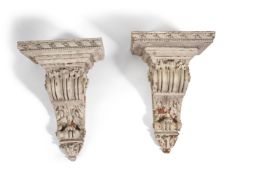 A Pair of George II style white painted pine wall brackets, Early 20th century, the rectangular tops