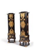 ϒ A pair of Japanese black and gilt-metal mounted tall display cabinets (Zushi), late Meiji period