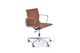 Charles and Ray Eames, an Aluminium Group swivel arm chair by Vitra