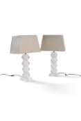 A pair of opaque glass table lamps