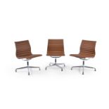 Charles and Ray Eames, three Aluminium Group side chairs by Vitra