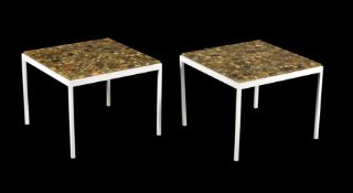 A pair of square travertine top lamp tables