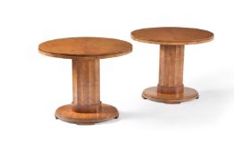 A pair of Art Deco walnut veneered oval occasional tables