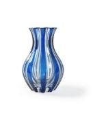 A modern St. Louis clear and blue overlay striped glass bud-shaped vase