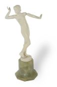 ϒ An Art Deco carved ivory figure