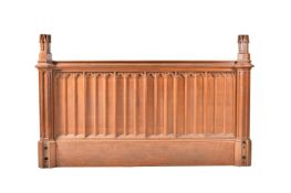 An early Victorian oak half-tester bed