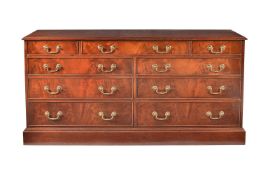 A modern reproduction mahogany bank of drawers