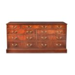 A modern reproduction mahogany bank of drawers
