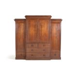 A George IV mahogany breakfront wardrobe