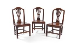 A set of six George III fruitwood side chairs