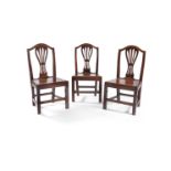 A set of six George III fruitwood side chairs