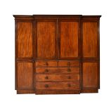 A George IV mahogany breakfront wardrobe