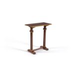 A Regency style walnut and gilt side table