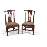 A pair of George III mahogany side chairs