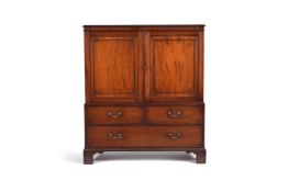 A George III mahogany low linen press