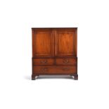 A George III mahogany low linen press