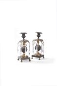 A pair of Regency gilt and patinated bronze lustre candlesticks