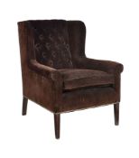 A late 20th century brown velvet upholstered wingback office armchair