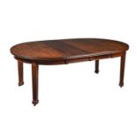 A mahogany D end extending dining table