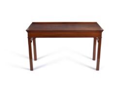 A George III and later mahogany side/serving table