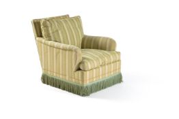 A green stripped upholstered arm chair