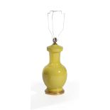 A yellow porcelain vase table lamp