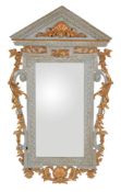 A George II stylecarved, painted and parcel-gilt wall mirror