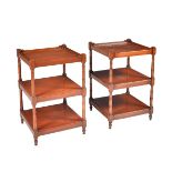 A pair of modern reproduction mahogany three tier side tables