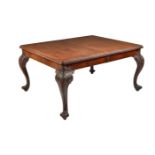 A mahogany extending dining table