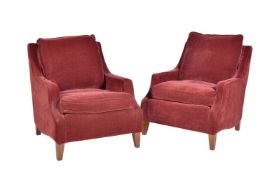 A pair of late 20th century maroon red upholstered office armchairs