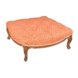 A beechwood low square stool in Louis XV manner