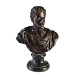A patinated bronze bust of a Roman Emperor